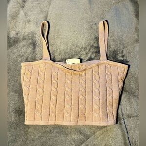 A tan knitted material tank top from altar’d state🤎